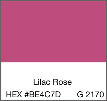 "Turkish towel in pink and black stripes, lightweight fabric draped on a neutral surface."